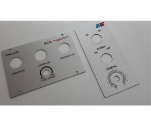 Close-up view of a custom engraved aluminum label created by Orkay Engraver, displaying impeccable engraving detail on a corrosion-resistant, durable surface